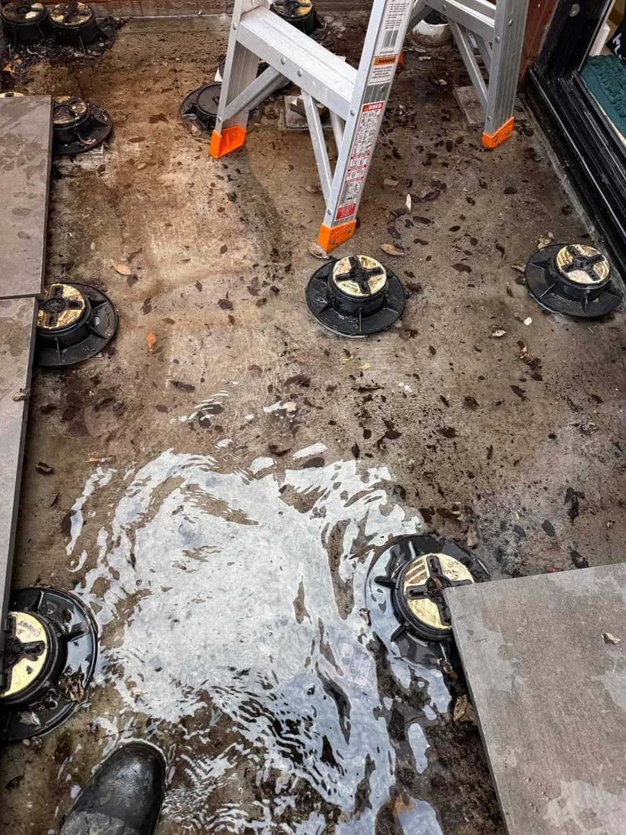 A balcony sectioned off and filled with water during a controlled flood test to trace a leak
