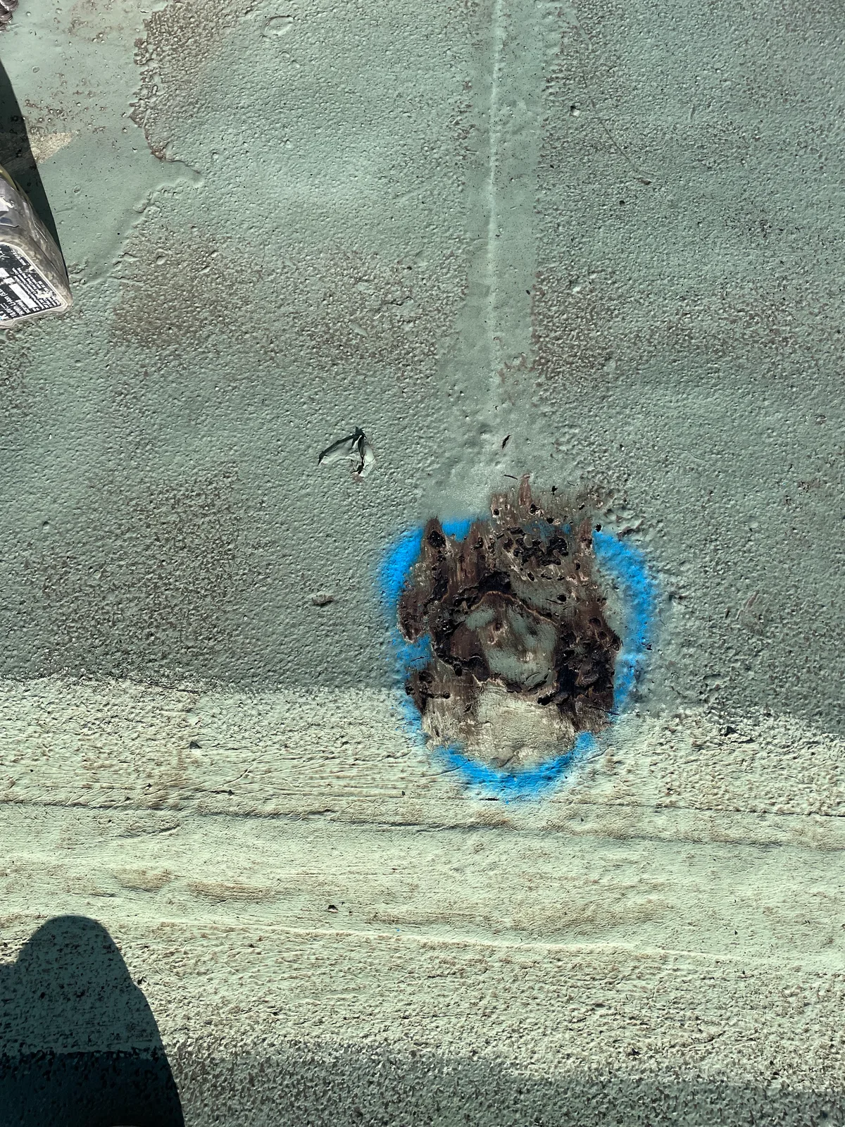 Core sample cut through the roof build-up, marked out on the membrane